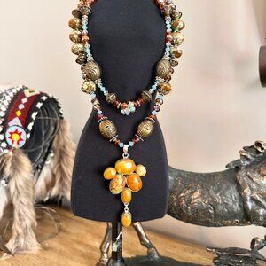 Stunning double strand statement necklace with  pendant and matching earrings.